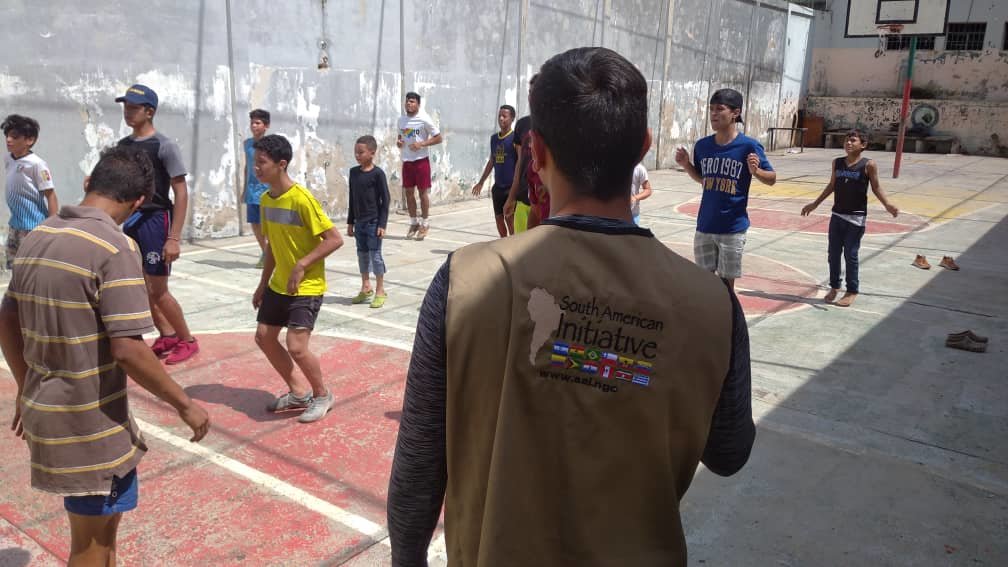 Children and teens participate in physical education exercises