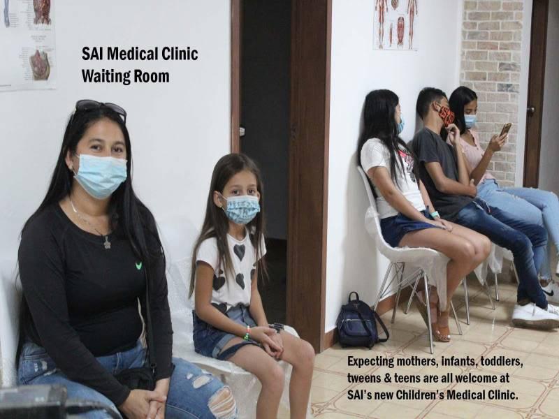 Patients and family members sit in the waiting room at SAI Medical Clinic in Venezuela.
