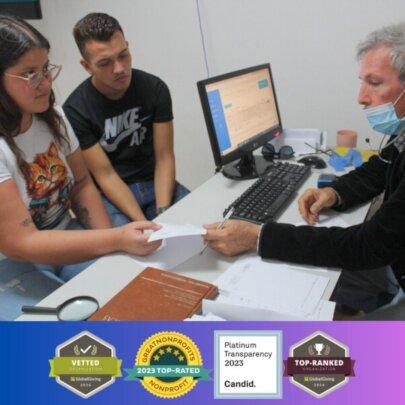 Happy Couple Receiving Healthcare in SAI Clinic