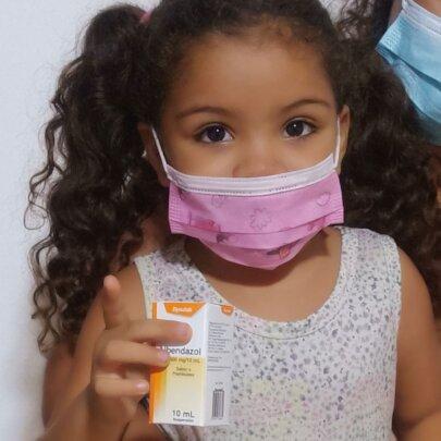 Happy Child Receiving Free Medicine and Healthcare at SAI Clinic