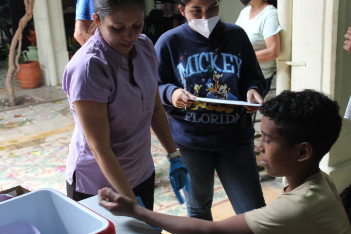 An orphan boy getting a check up